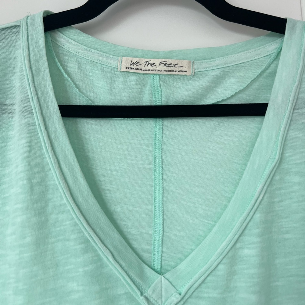 We The Free by Free People mint long sleeved v neck top. Size XS (extra small).